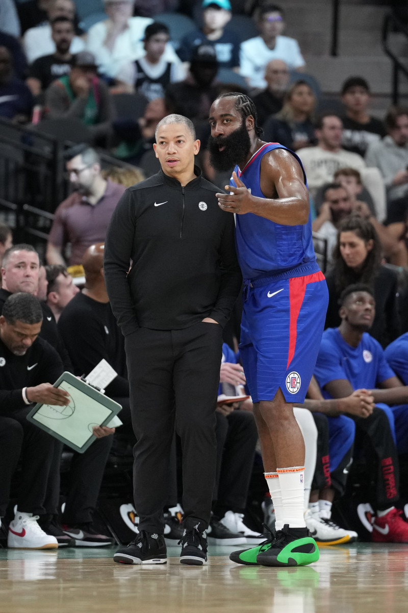 Nov 20, 2023; San Antonio, Texas, USA; LA Clippers head coach Tyronn Lue talks with guard James Harden (1) in the first half against the San Antonio Spurs at the Frost Bank Center.